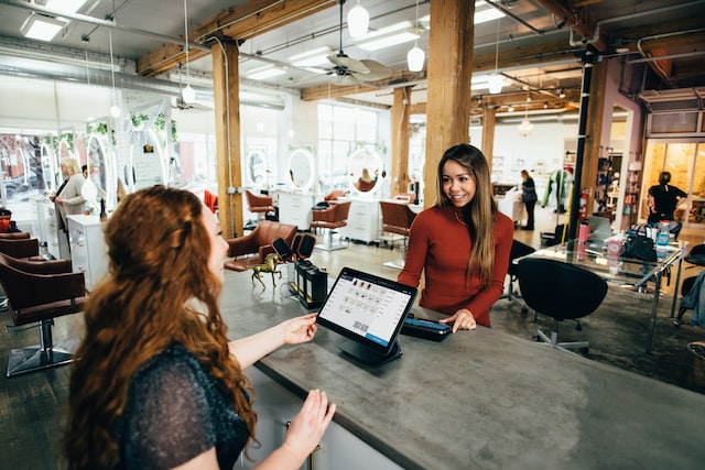 A small business owner and customer having a conversation